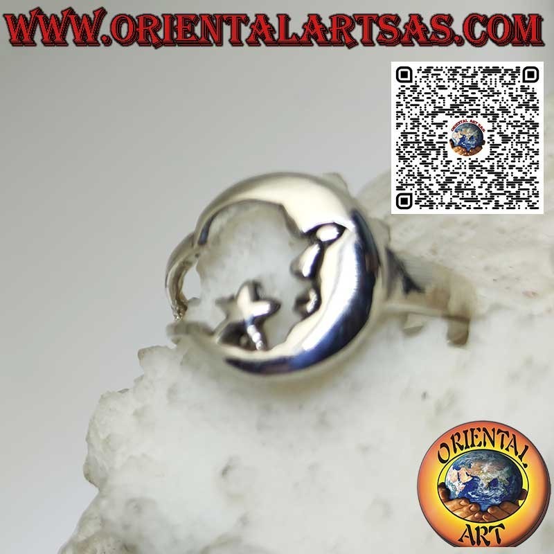Silver ring depicting the moon with its face looking at the star