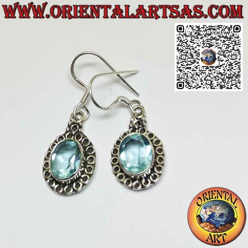 Orecchini in argento con topazio azzurro incastonato e contornato da cerchi
