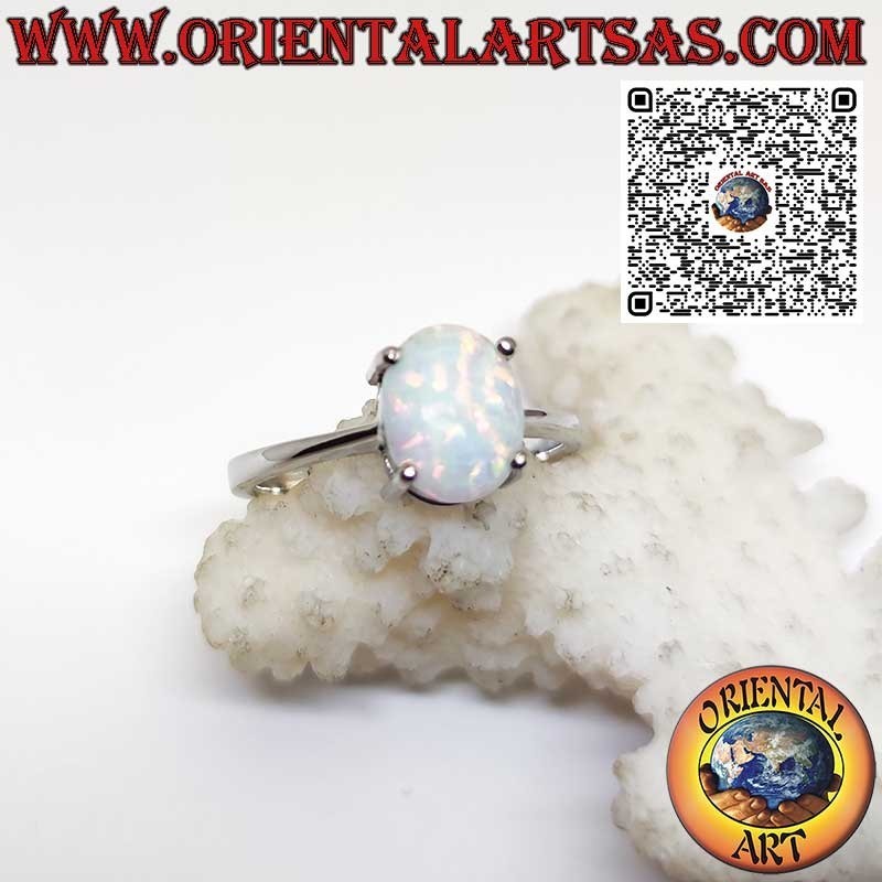 Silver ring with oval harlequin opal set with 4 prongs