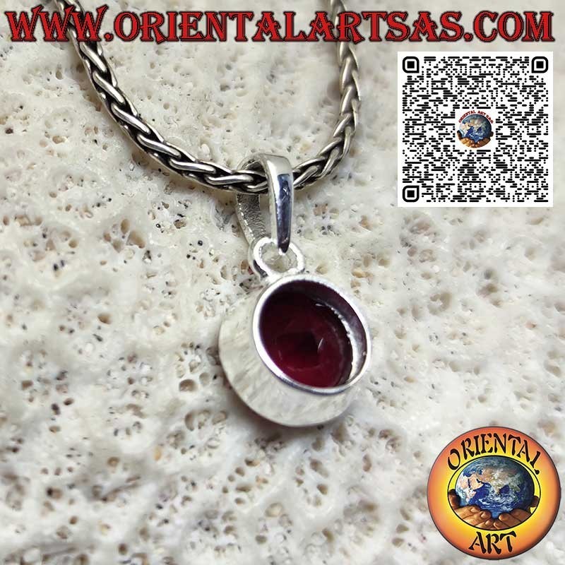Silver pendant with oval garnet on a smooth high setting
