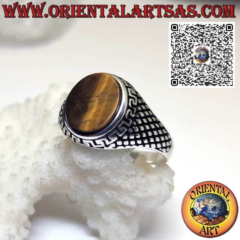 Silver ring with flat oval tiger's eye surrounded by fret