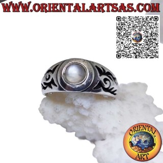 Silver ring with natural moonstone and Maori engravings on the sides