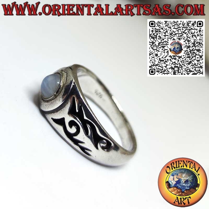 Silver ring with natural moonstone and Maori engravings on the sides