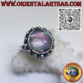 Round silver ring with Paua abalone shell surrounded by dots