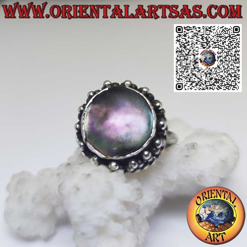 Round silver ring with Paua abalone shell surrounded by dots