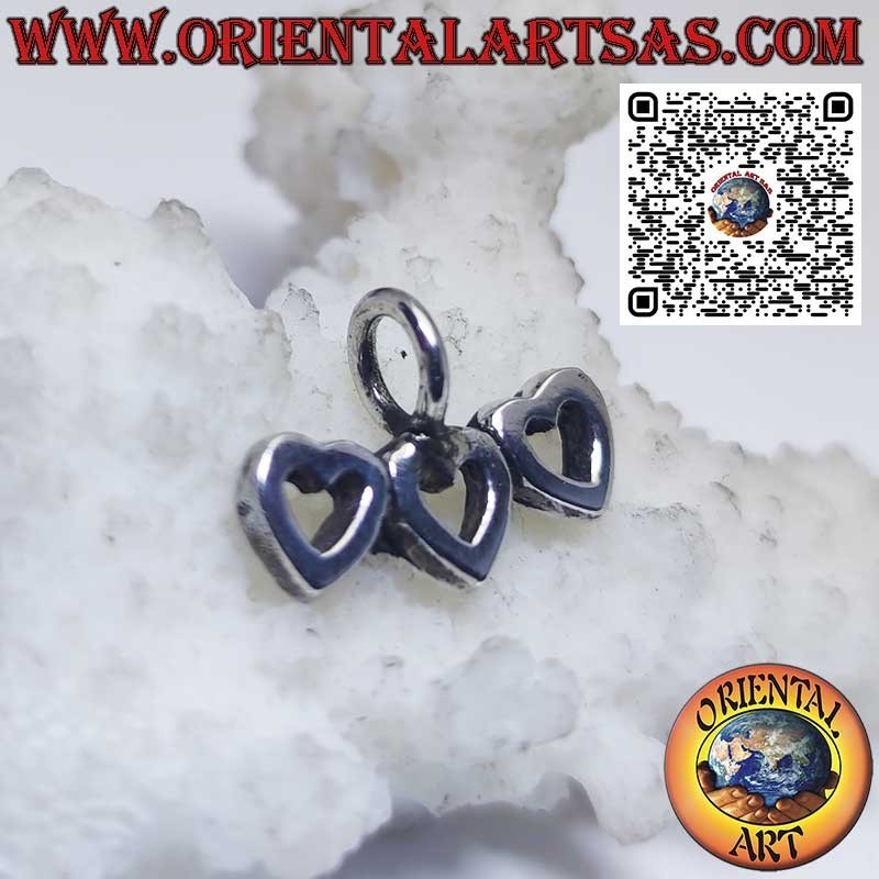 Silver pendant, trio of hearts