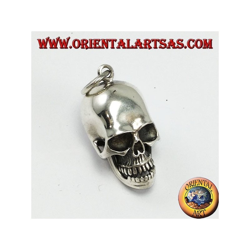 Pendentif en argent avec mandibule mobile et crâne ouvert