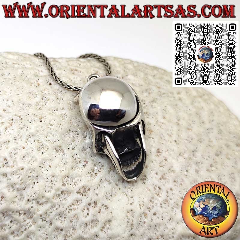 Pendentif en argent avec mandibule mobile et crâne ouvert