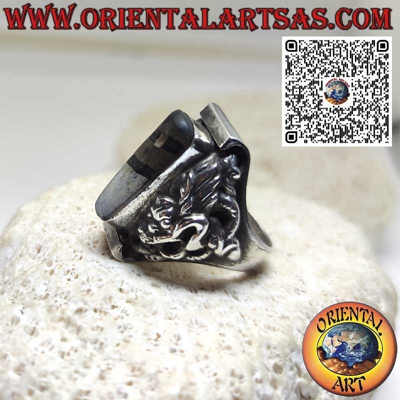 Silver ring with an ancient Tibetan Dzi and dragon in relief on the sides