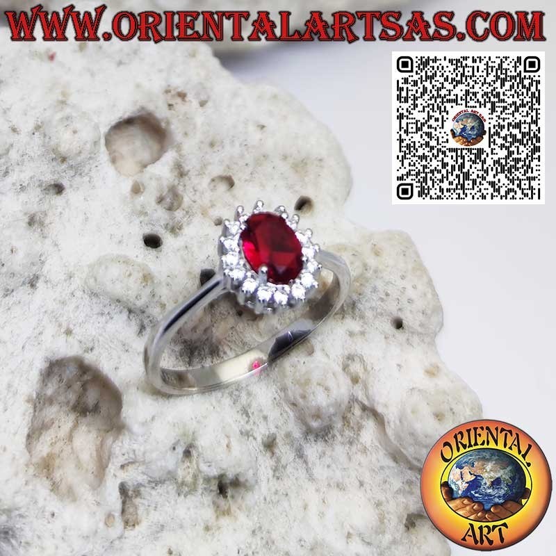 Bague en argent avec grenat ovale serti de zircons