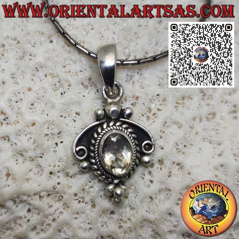 Silver pendant with natural yellow topaz on ethnic setting