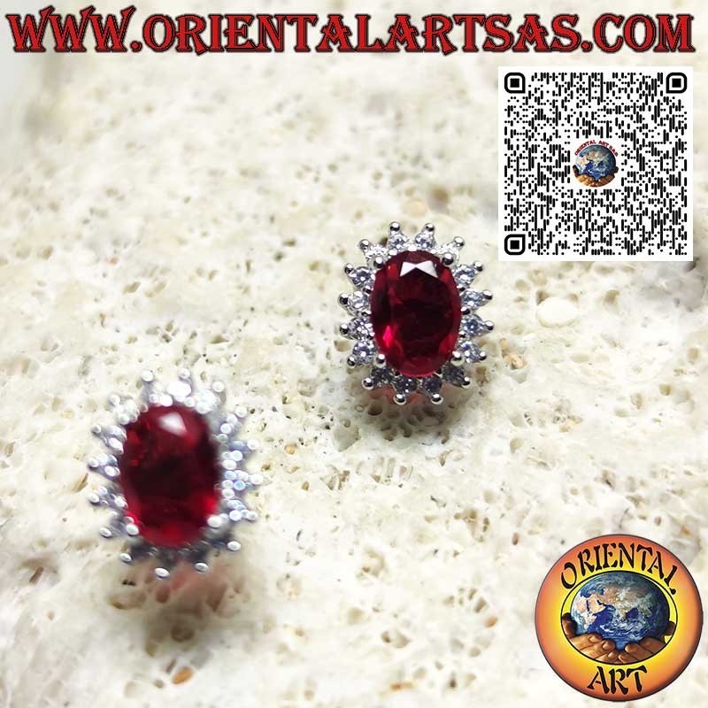Silver lobe earrings with oval garnet surrounded by zirconia. small