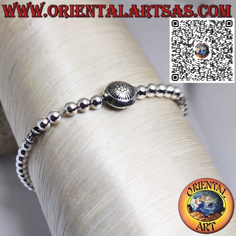 Bracelet en argent avec sphères et soleil central avec fermeture à boule coulissante