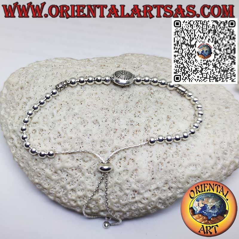 Bracelet en argent avec sphères et soleil central avec fermeture à boule coulissante