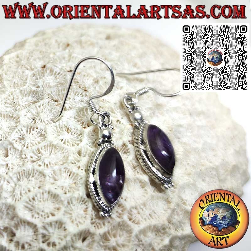 Silver earrings with a cabochon shuttle amethyst surrounded by braid