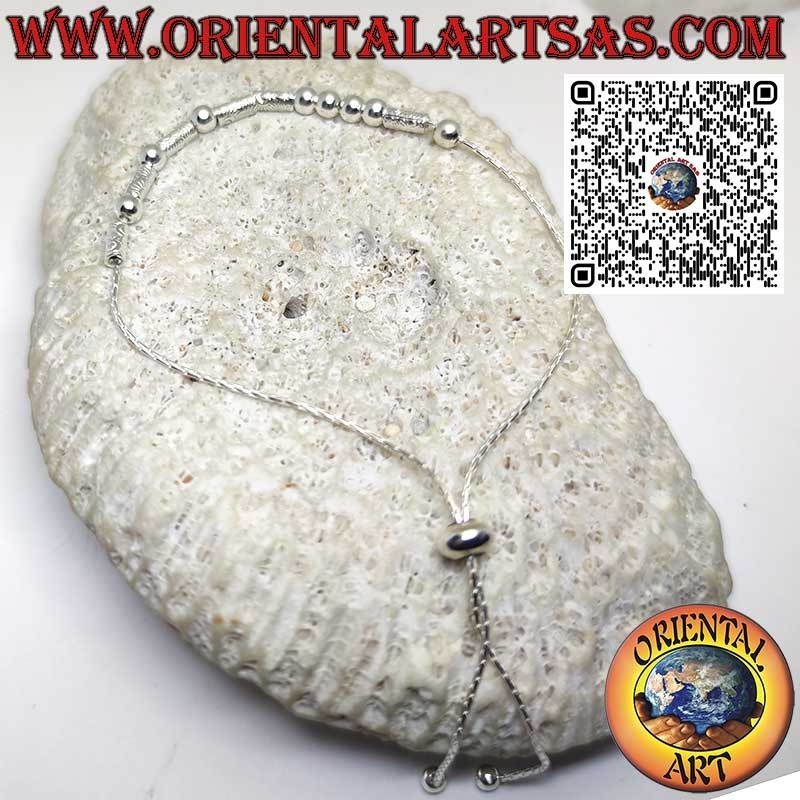 Bracciale in argento di sfere e tubicini con chiusura pallina scorrevole