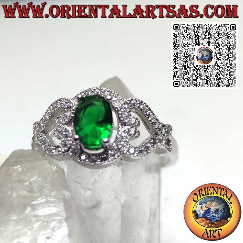 Silver ring with an oval synthetic emerald set with hearts on the sides, encrusted with zircons