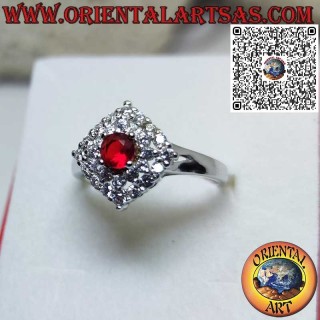 Silver ring with synthetic round ruby set surrounded by rhombus zirocones