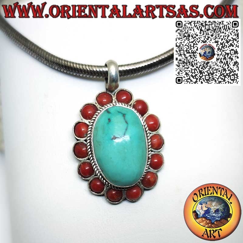 Handcrafted 925 silver pendant with an oval natural Tibetan turquoise and 14 red corals. A unique piece with ethnic charm.