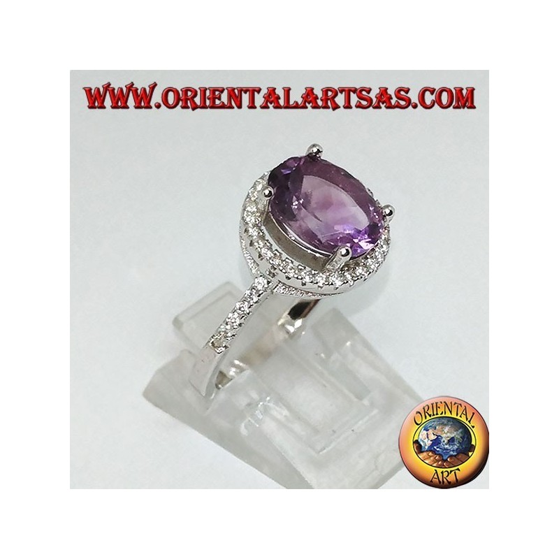 Bague en argent avec améthyste naturelle suspendue à un cercle de zircons