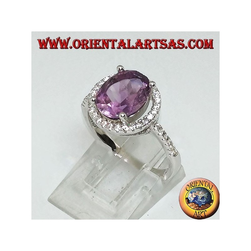 Bague en argent avec améthyste naturelle suspendue à un cercle de zircons