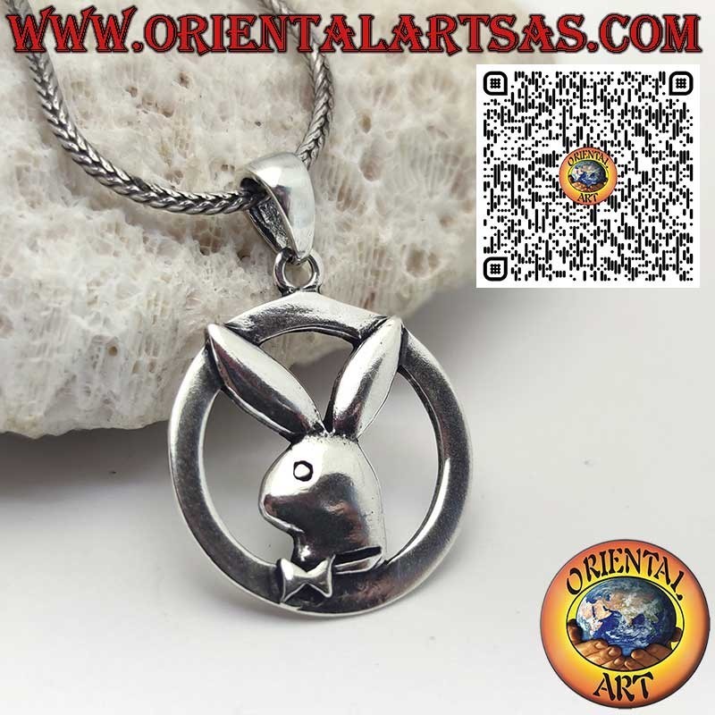 Silver pendant in the shape of a "playboy" bunny in the circle