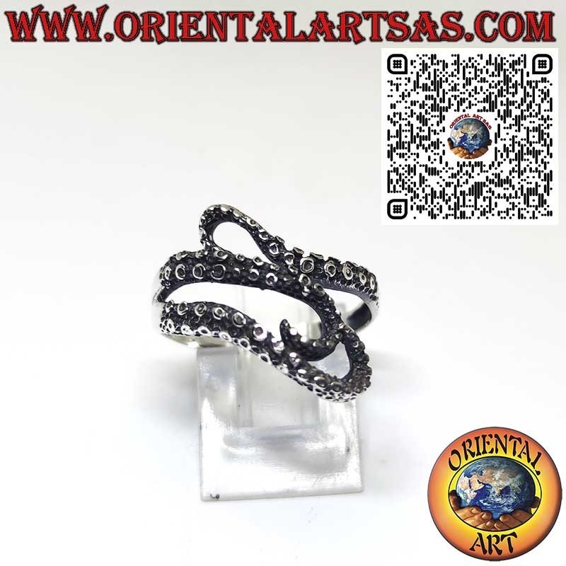 Silver ring, the three tentacles of the enveloping octopus