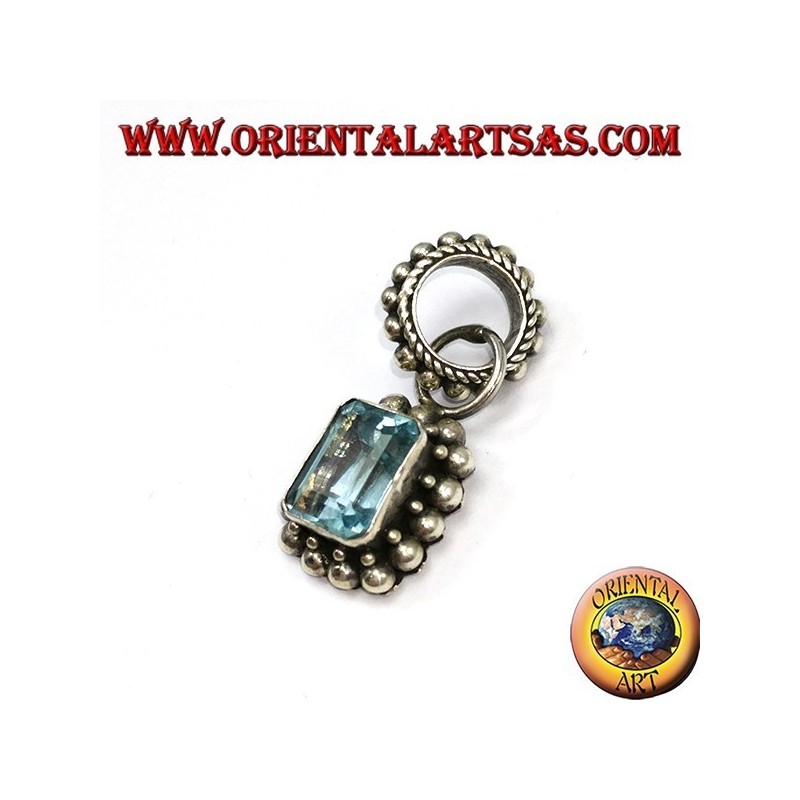Silver pendant with rectangular natural blue topaz