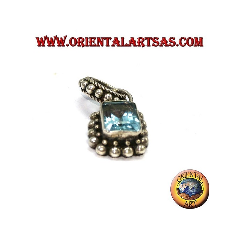 Silver pendant with rectangular natural blue topaz