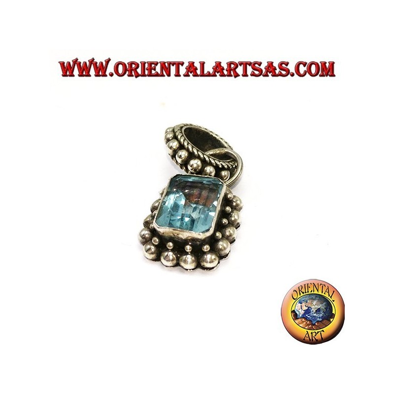 Silver pendant with rectangular natural blue topaz