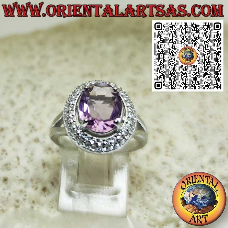 Anillo de lujo en plata 925‰ con espectacular amatista ovalada natural y doble corona de circonitas brillantes