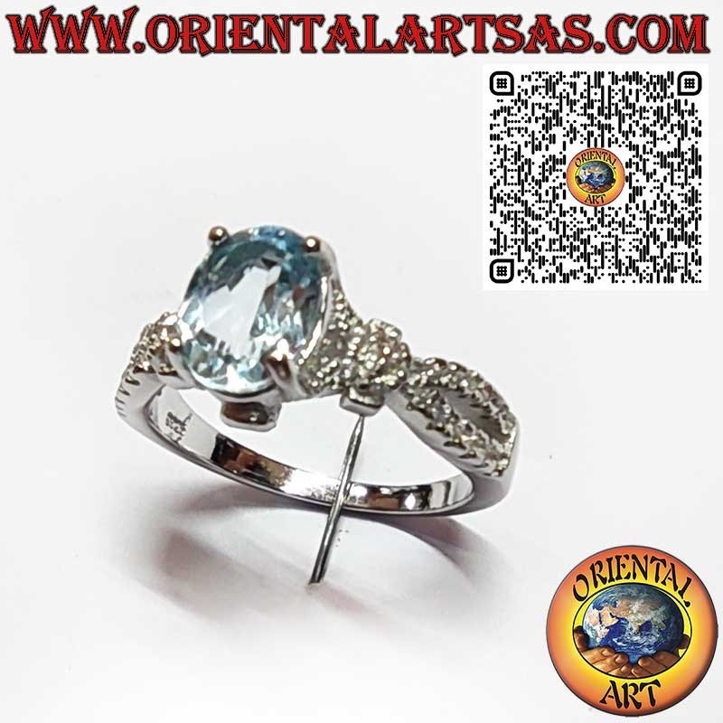 Anillo de Plata 925 con Topacio Azul Ovalado y Circonitas Laterales