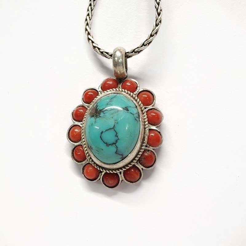 Silver pendant with oval natural Tibetan turquoise and 13 corals