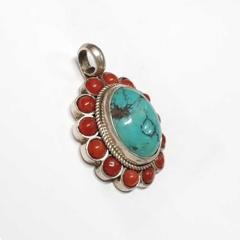 Silver pendant with oval natural Tibetan turquoise and 13 corals