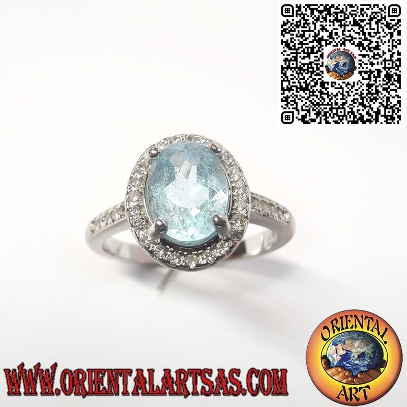 Anillo de Plata 925 con Topacio Azul Natural Ovalado Rodeado de Circonitas