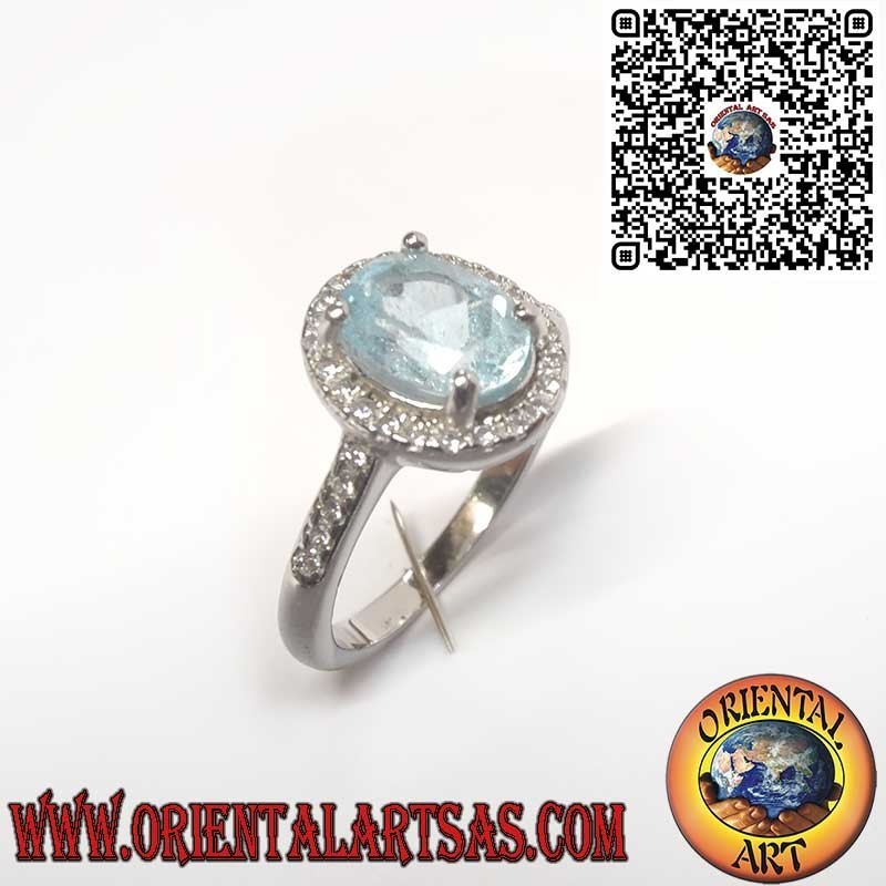Anillo de Plata 925 con Topacio Azul Natural Ovalado Rodeado de Circonitas