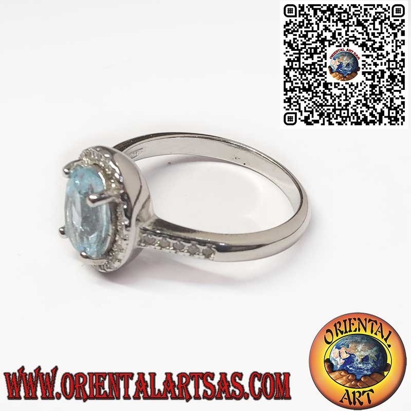 925 Sterling Silver Ring with Natural Oval Blue Topaz Surrounded by Zircons