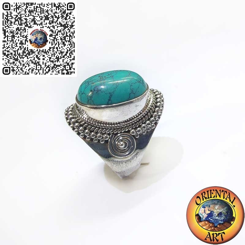Anello in argento con turchese cabochon ornata da intreccio e spirale