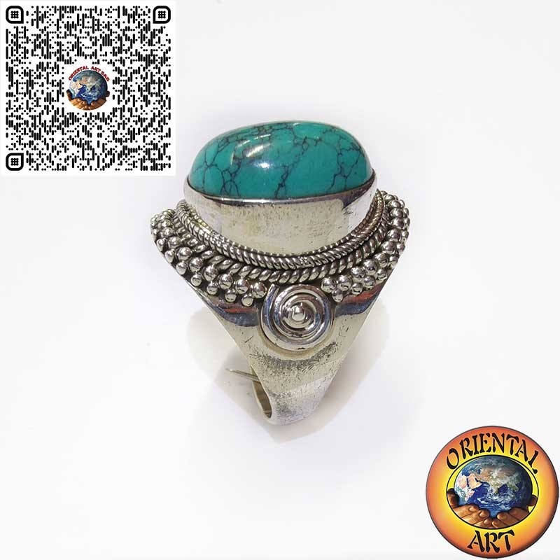 Bague en argent avec cabochon turquoise orné d'entrelacs et de spirale
