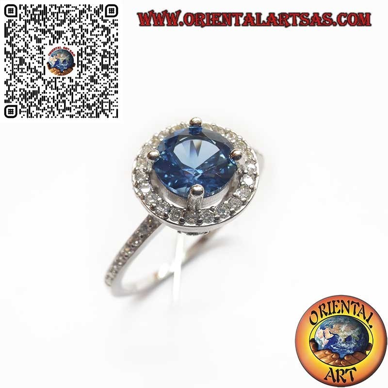 Bague en Argent 925 avec un Saphir rond de synthèse lumineux entouré de Zircons