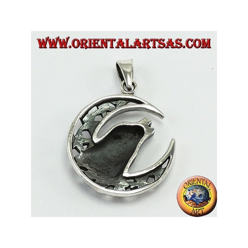 Pendentif en argent Loup mâchant à la lune