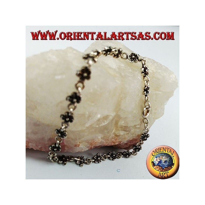 Silver bracelet with 20 double-sided flowers