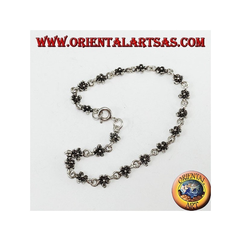 Silver bracelet with 20 double-sided flowers