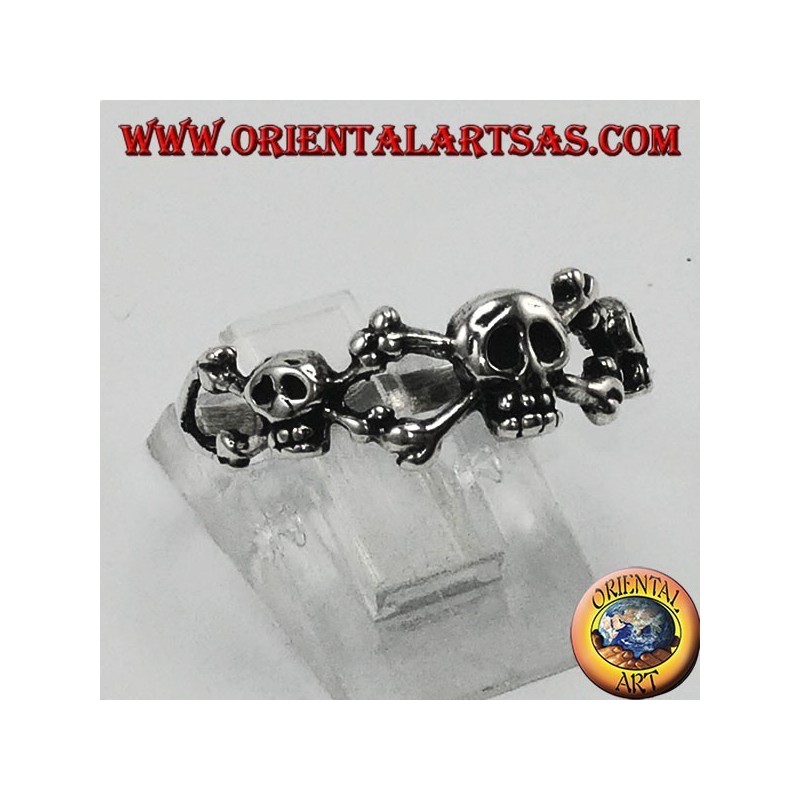 Anello in argento tre teschi con osse